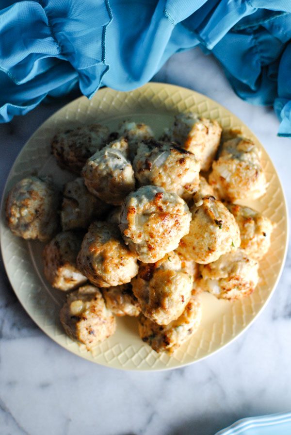 Whole30 Chicken Basil Meatballs! they're just SO good. we're OBSESSED over here in our house. as in eating them for breakfast lunch and dinner OBSESSED. Pair them with some steamed broccoli and you've got a fully whole30 compliant meal! | thepikeplacekitchen.com